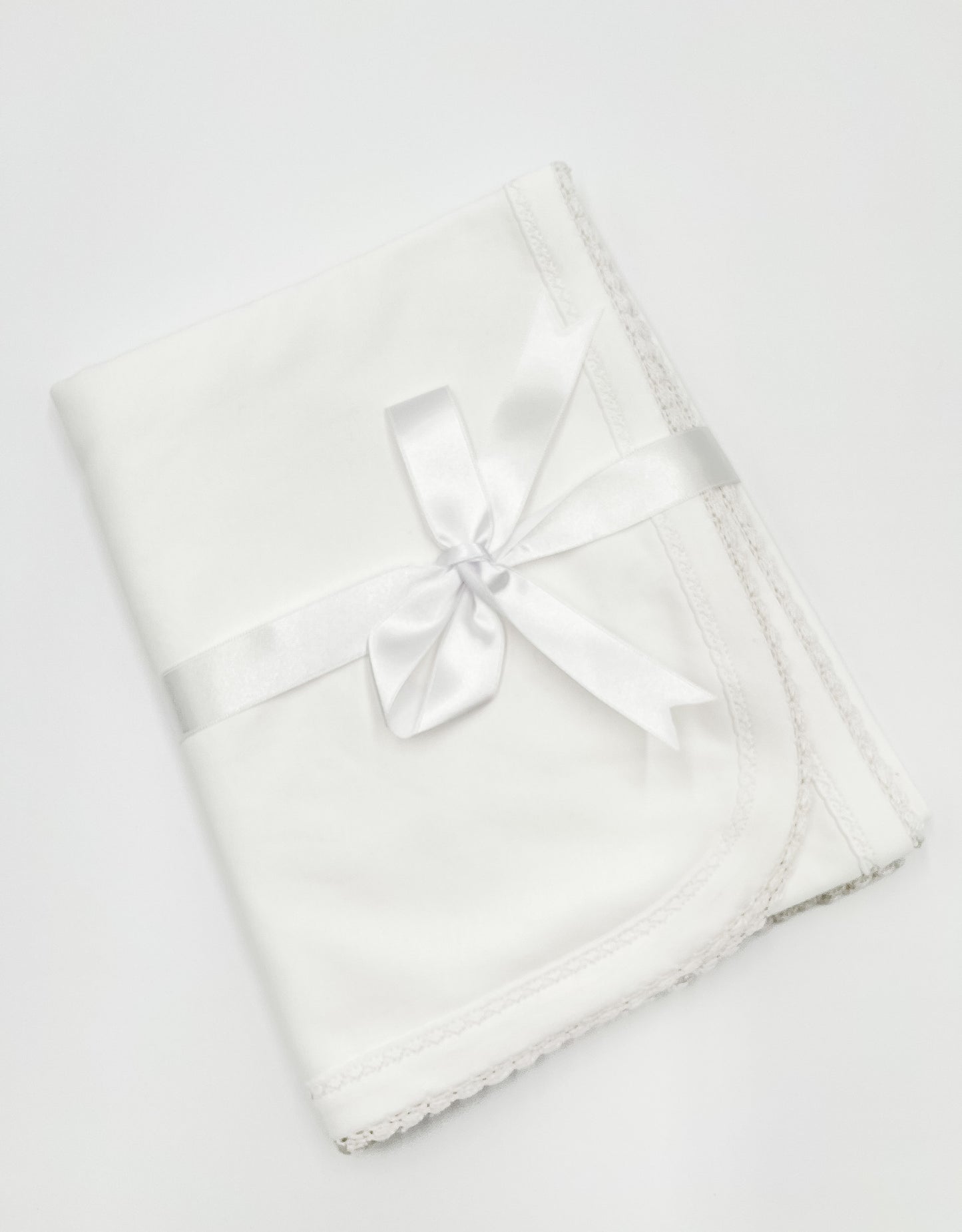 White blanket w/ white trim